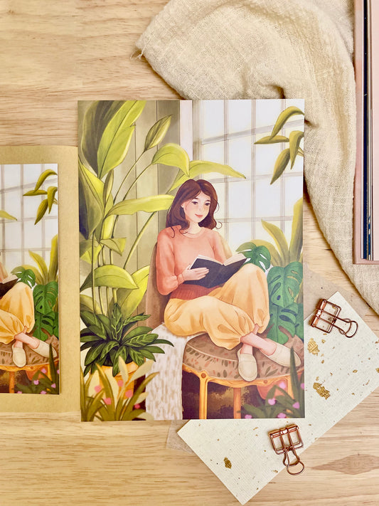 art print of a girl reading and surrounded by plants